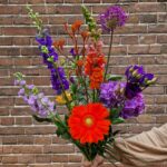 Los gebonden boeket oranje/paars
